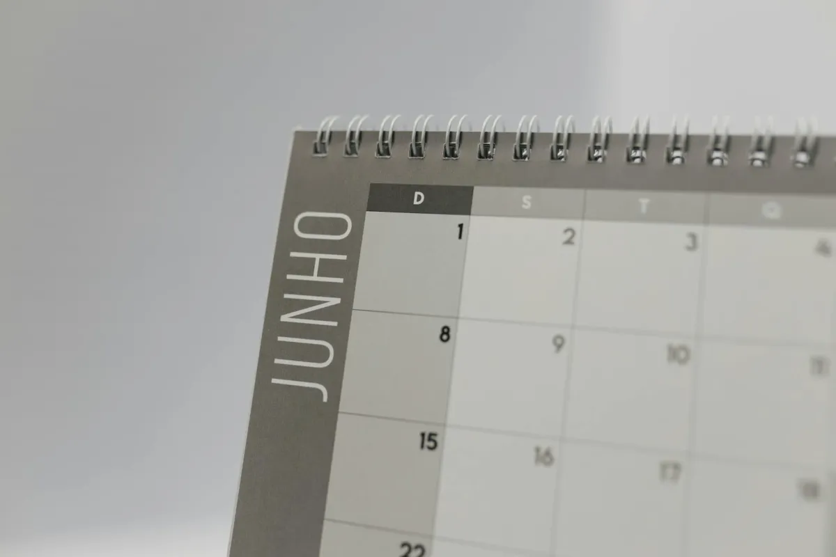 Frustrated woman checking phone calendar with confused expression about missed appointment